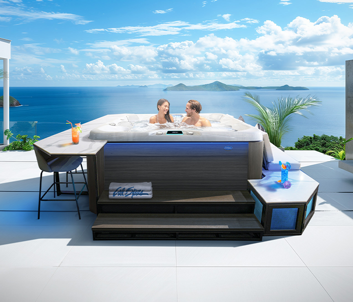 Calspas hot tub being used in a family setting - Candé